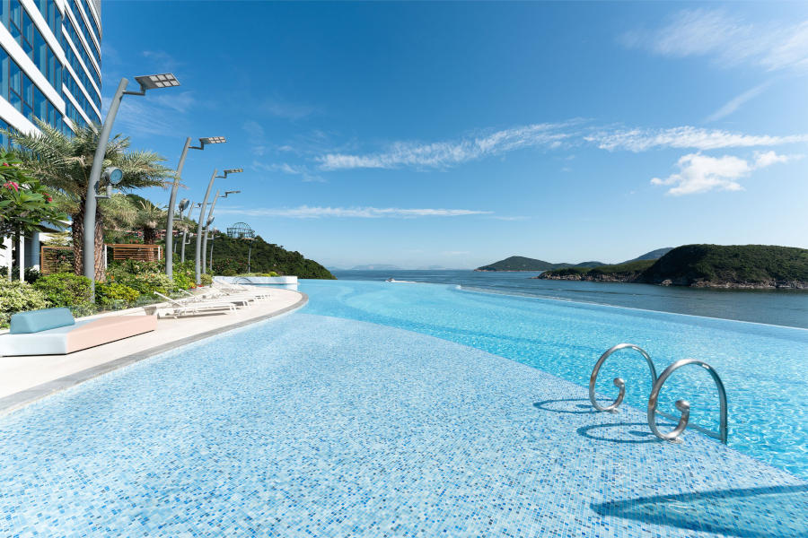 fullerton ocean park hotel swimming pool next to the sea on a sunny day