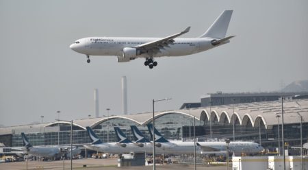 Airplane landing at Hong Kong International Airport