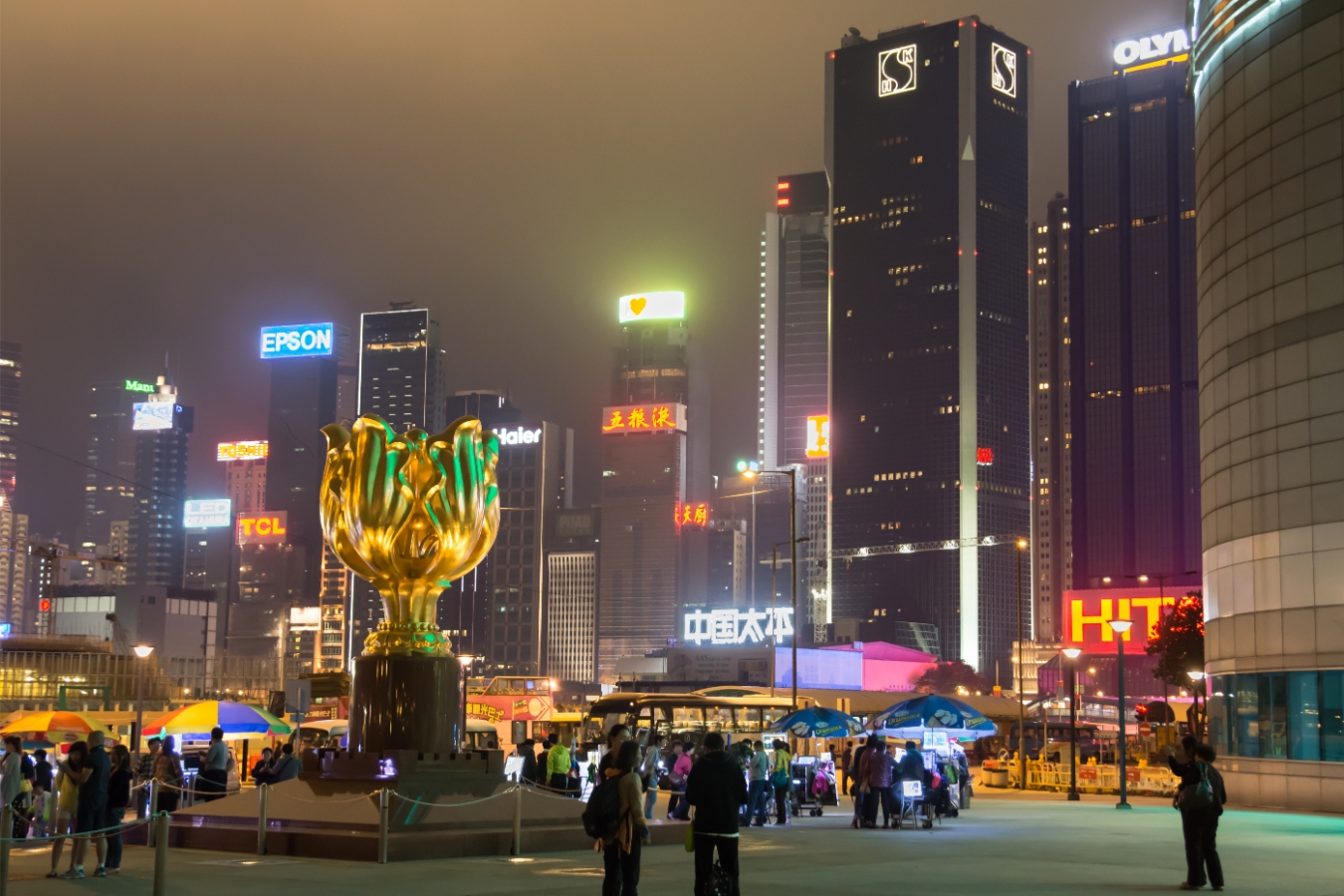 golden bauhinia square against the backdrop of hong kong skyscrapers.