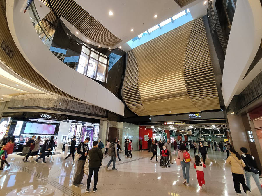 shoppers entering popcorn mall from tseung kwan o mtr station